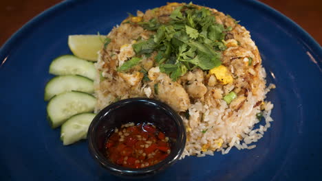 crab fried rice plated, restaurant order of decadent crab fried rice, slider close up 4k