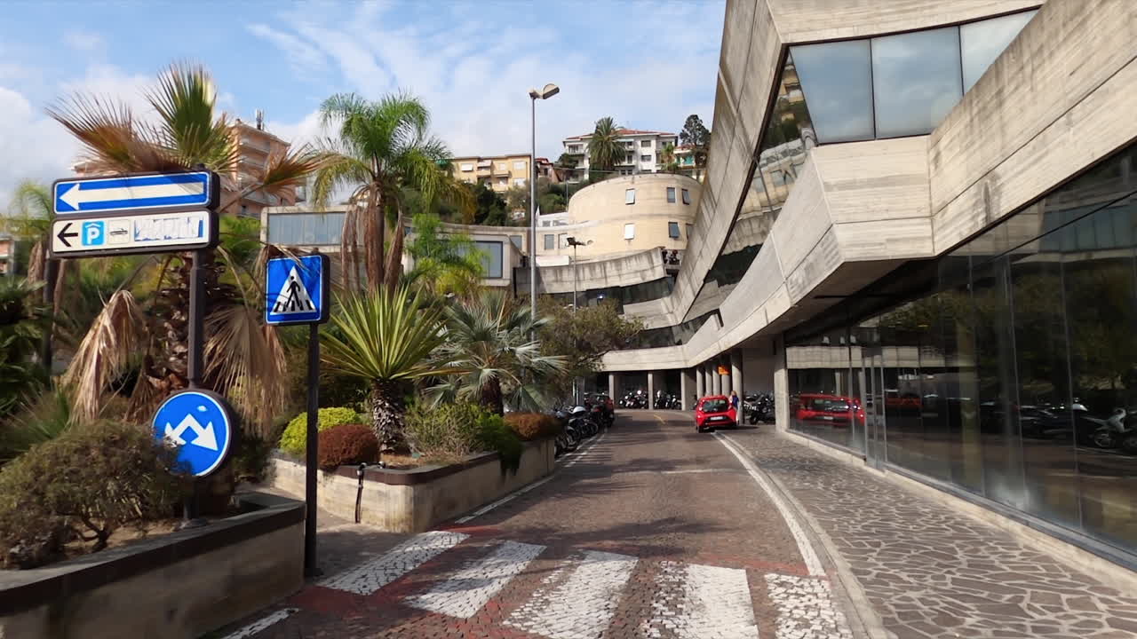 Sanremo, Italy -December 28, 2021: Street view of the Sanremo railway station on a sunny day