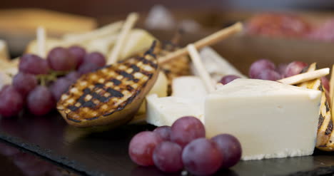 different types of cheese on wooden board in the restaurant 1