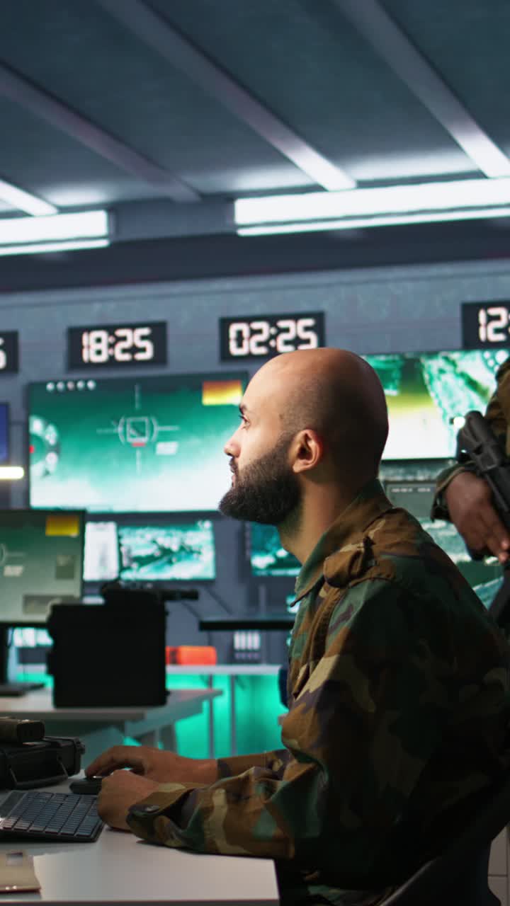 Vertical video Soldier doing tasks in military base, doing surveillance with radar equipment