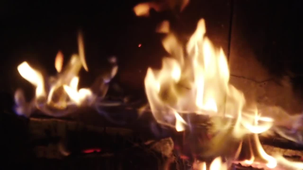 Fire in a fireplace. Fire shooting