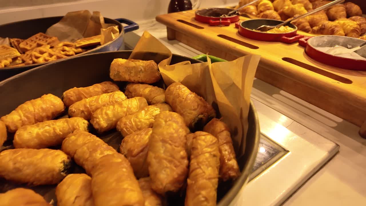 Buffet with Croissants and Waffles