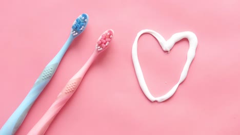 toothbrushes and toothpaste heart