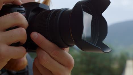 camera man make picture on blog close up. photographer take photo on holiday.