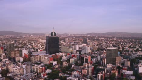 wide angle aerial shot flying over colonia del valle capital centre in mexico