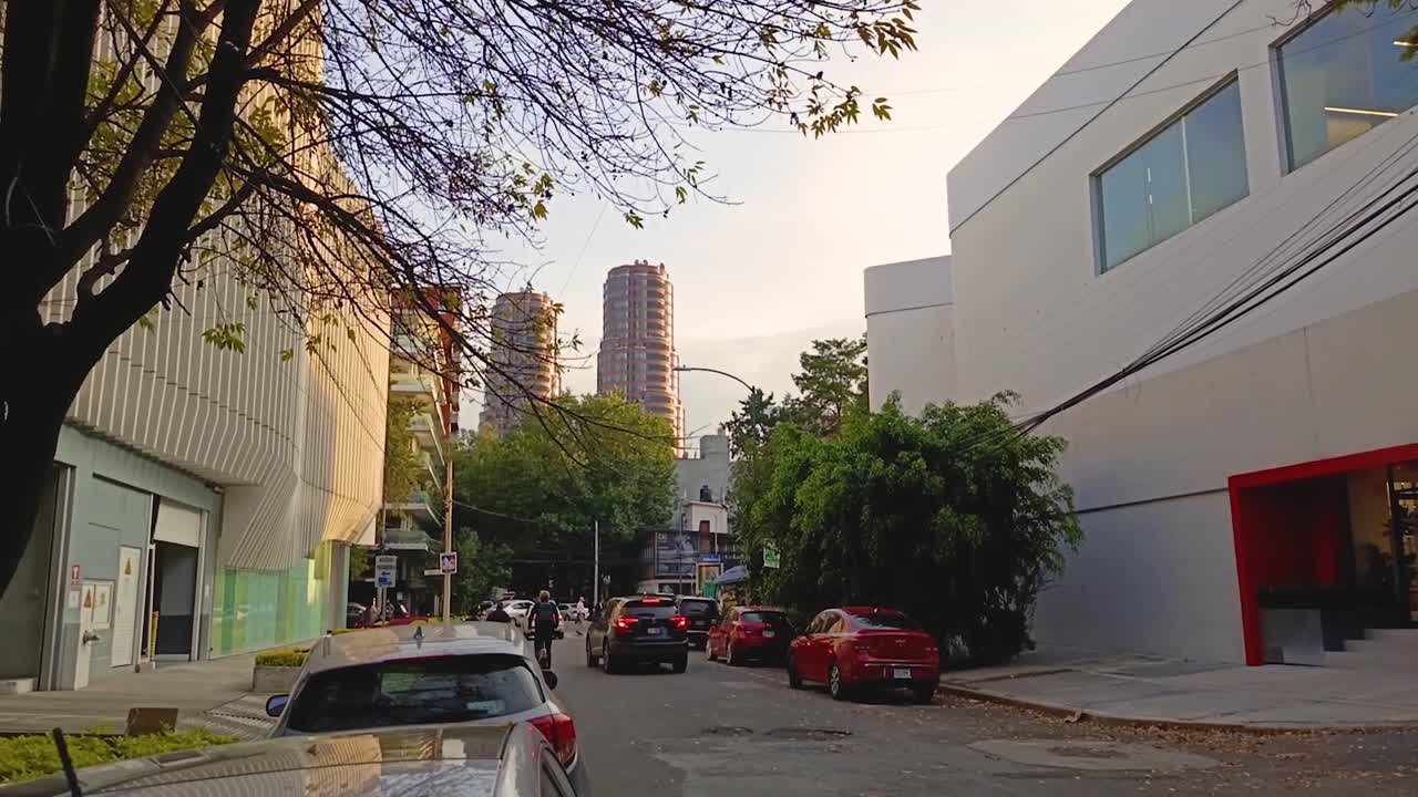 Static shot of an autumn sunset with views of twin residential towers in the Polanco area of Mexico City
