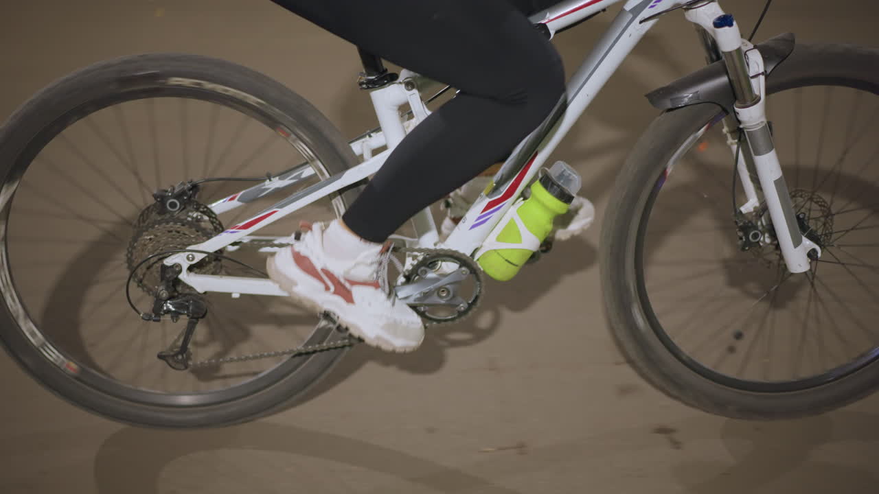 Night Cycling Detail, Bicycle Pedal Contact At Night, Closeup Of Bike Pedal And Chain During Night Ride, Detailed View Of Cyclist Pedal And Chain Motion During Steady Night Ride In Park