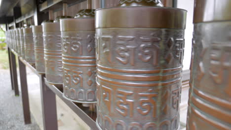 Rotating-copper-cylinders-in-Kodai_Ji-temple,-Kyoto,-Japan