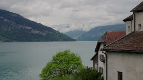 swiss lakeside village with mountains