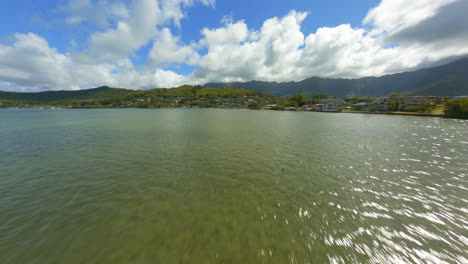 soaring over oahu on a summer day, fpv drone footage of ocean and gorgeous rocky terrain of eastern oahu