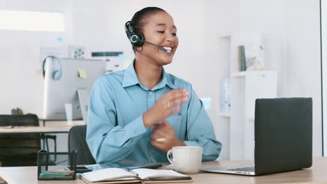 Happy-black-call-center-agent-talking