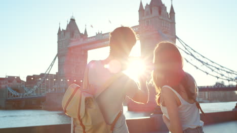 a couple taking photos using a smartphone