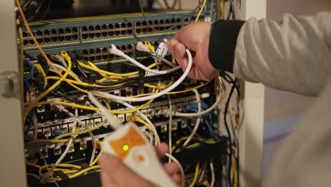 technician configures the network equipment in the server room