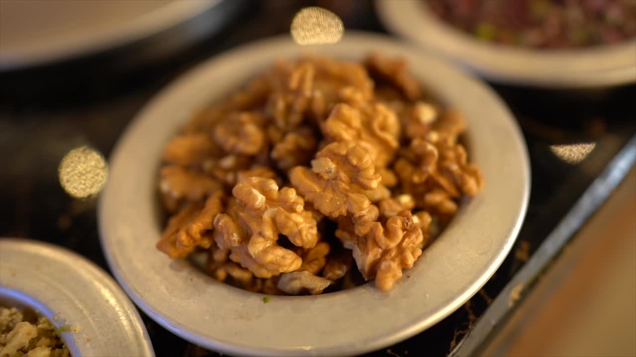 Natural peeled walnuts in an iron plate