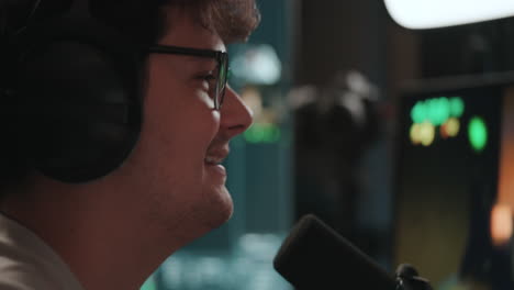 man recording podcast or radio show