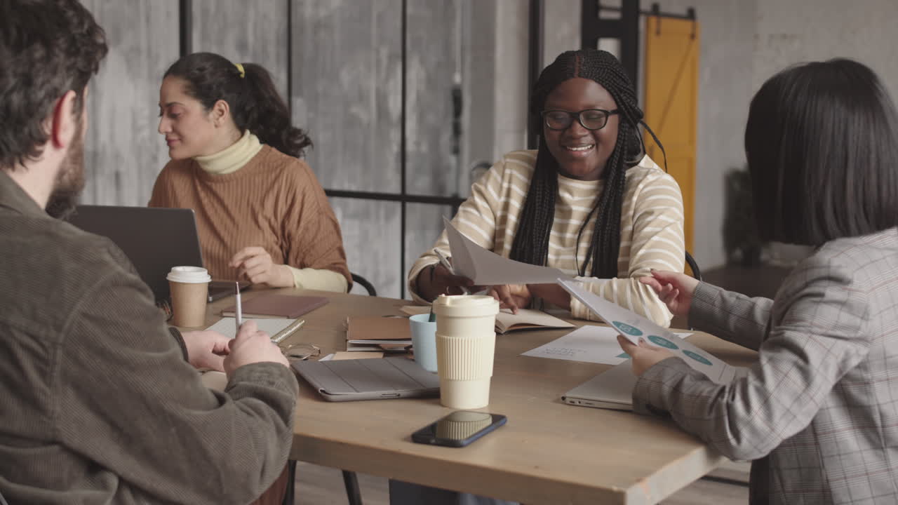 Diverse Businesspeople Having Meeting in Office