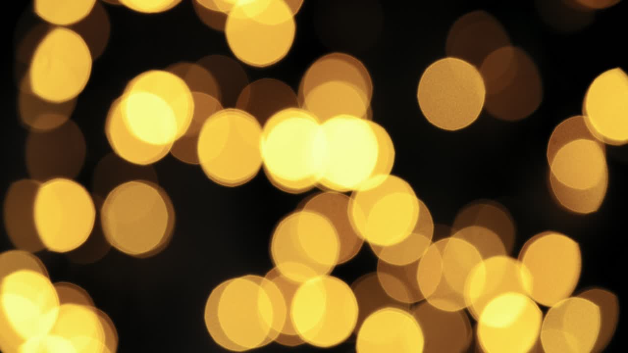 la luz fuera de foco parpadea sobre un fondo negro oscuro