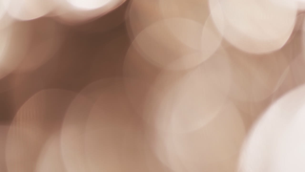 video de puntos de luz bokeh amarillos parpadeantes con espacio de copia