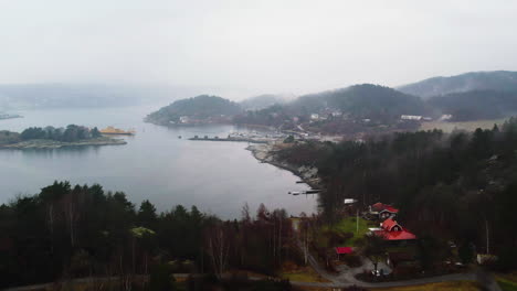 Views-of-the-Strait-between-Orust-and-Bohuslan-a-Misty-Day,-Sweden,-Aerial