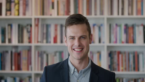 portrait-successful-young-businessman-laughing-enjoying-business-success-attractive-male-lawyer-in-library-bookshelf-background-slow-motion-real-people-series