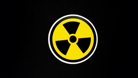 símbolo de signo nuclear girar alrededor aislado en fondo negro. símbolo de radiación