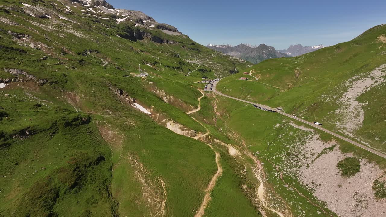 Urnerboden valley in Klausenpass surrounded by alpine mountains and scenic Swiss landscape