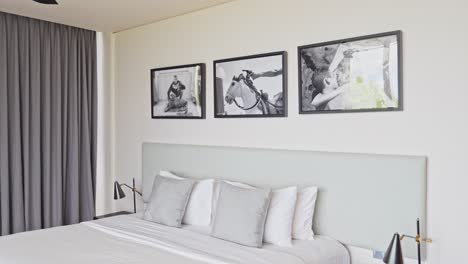 3-unique-pieces-of-artwork-above-hotel-room-bed