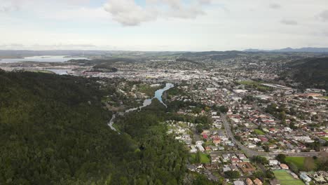 panorama of whangarei city from mount parihaka with dense forest at daytime in new zealand