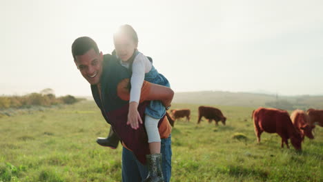 father piggy back young girl on farm