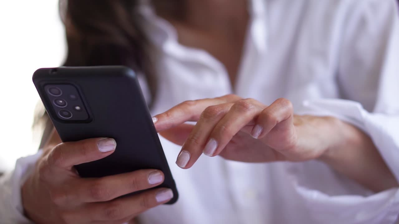 young woman browsing her smartphone