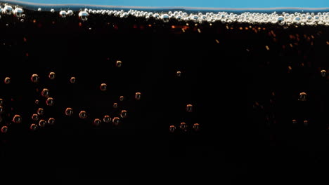 close-up of soda bubbles and foam
