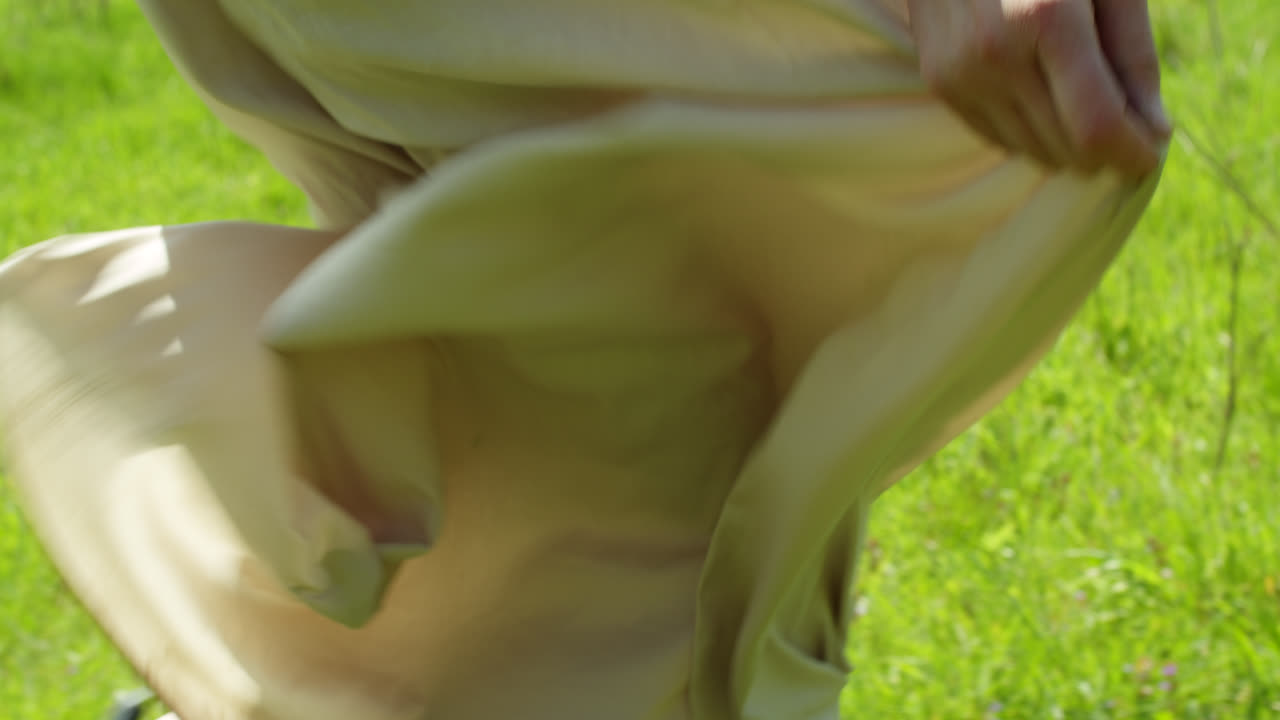 Person Running Through Grass