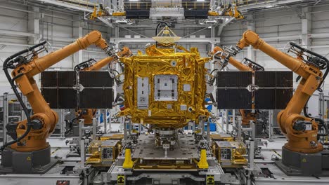 advanced robotic arms and high-technology spacecraft assembly in a high-tech facility with intricate configuration and precise engineering practices demonstrating innovation