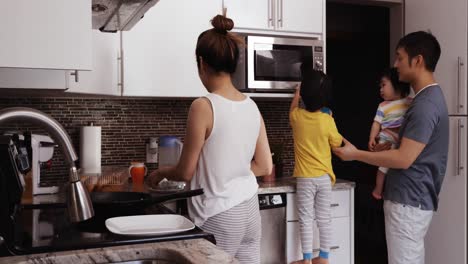 family enjoying time relaxing together at home