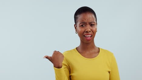 Confused,-face-and-black-woman-with-hand-pointing