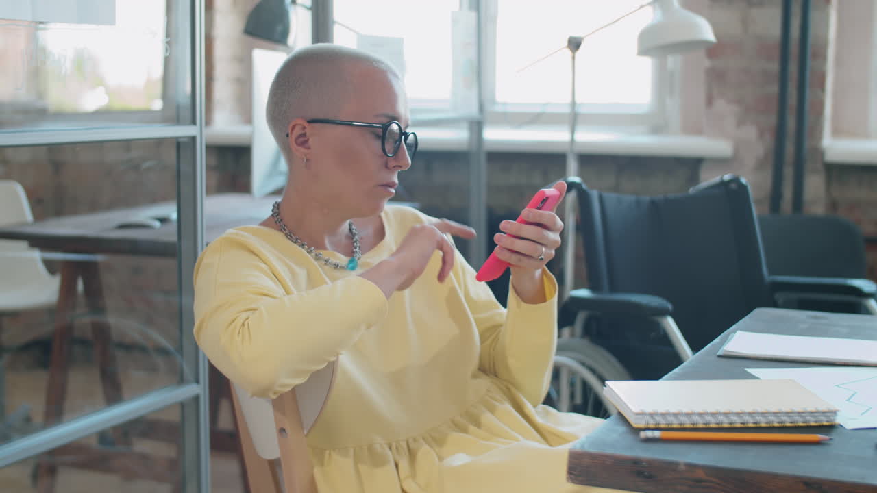 Businesswoman Recording Voice Message and Using Smartphone