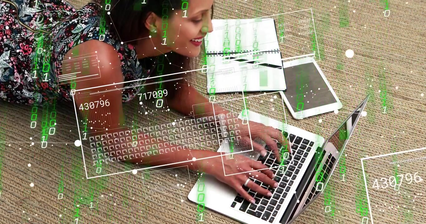 Leaning on arms woman in florals typing on laptop home studying with green overlay, copy space