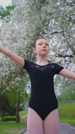 young ballerina in a park