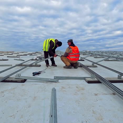 technician installing solar panels