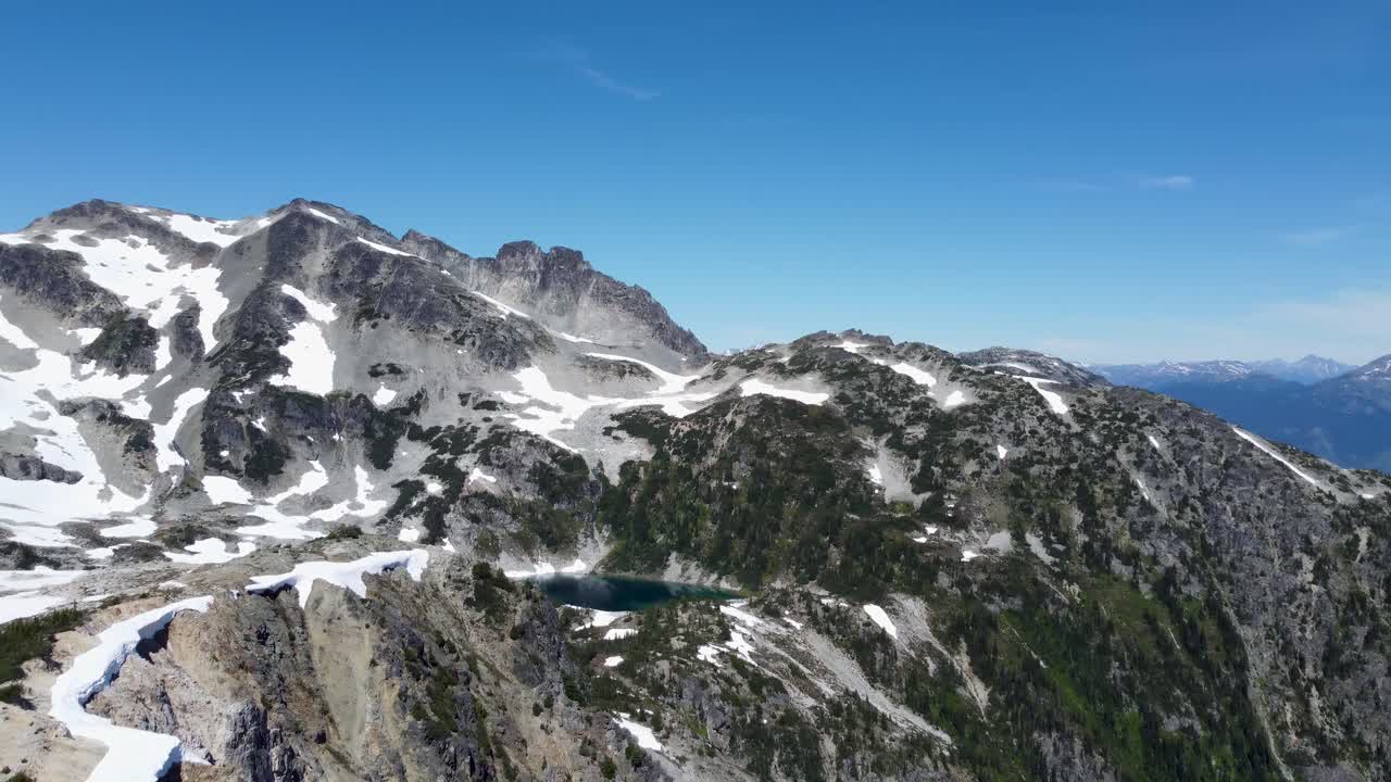 Epic Mountain Landscape Panning Shot of Sugarloaf Mountain Peak in Pacific Ranges Aerial Drone Canada 4K