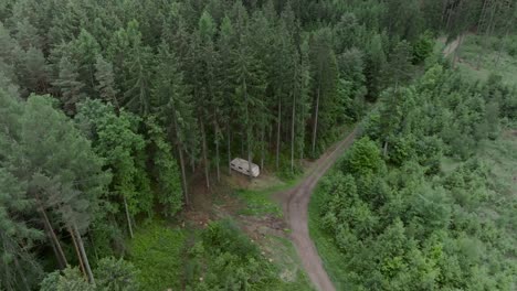 abandoned caravan in the forest