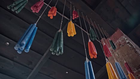 colorful candles hanging on string in guatemala