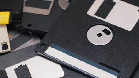 using diskette for old computer. music recorder, playing retro computer games. vintage device for office, obsolete technology. . high quality 4k footage