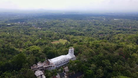 Aerial-view-of-"Gereja-Ayam"-or-Chicken-church-on-the-Rhema-Hill,-Borobudur,-Indonesia