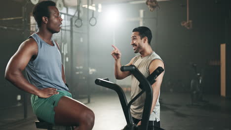 Man,-cycling-and-personal-trainer-in-high-five