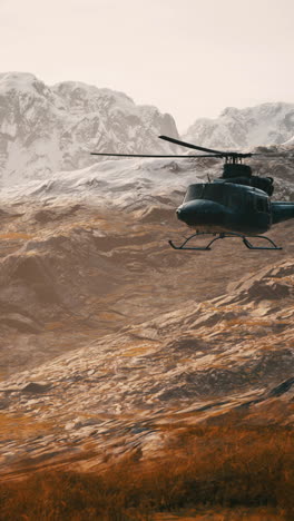 helicopter flying over snowy mountains