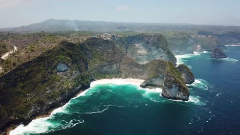 kelingking beach a t-rex head shape cliff on nusa penida, bali