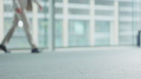 legs, floor and walking with business people