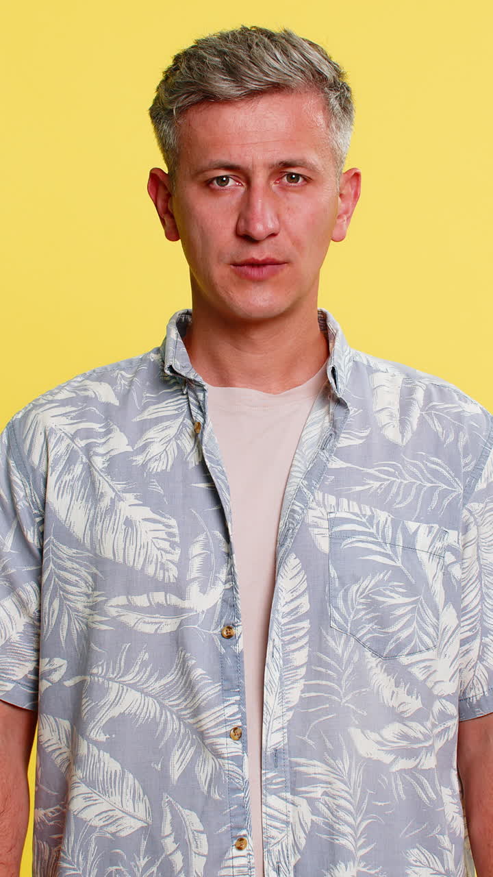 Adult man touching cheek with painful expression suffering from strong toothache dental discomfort