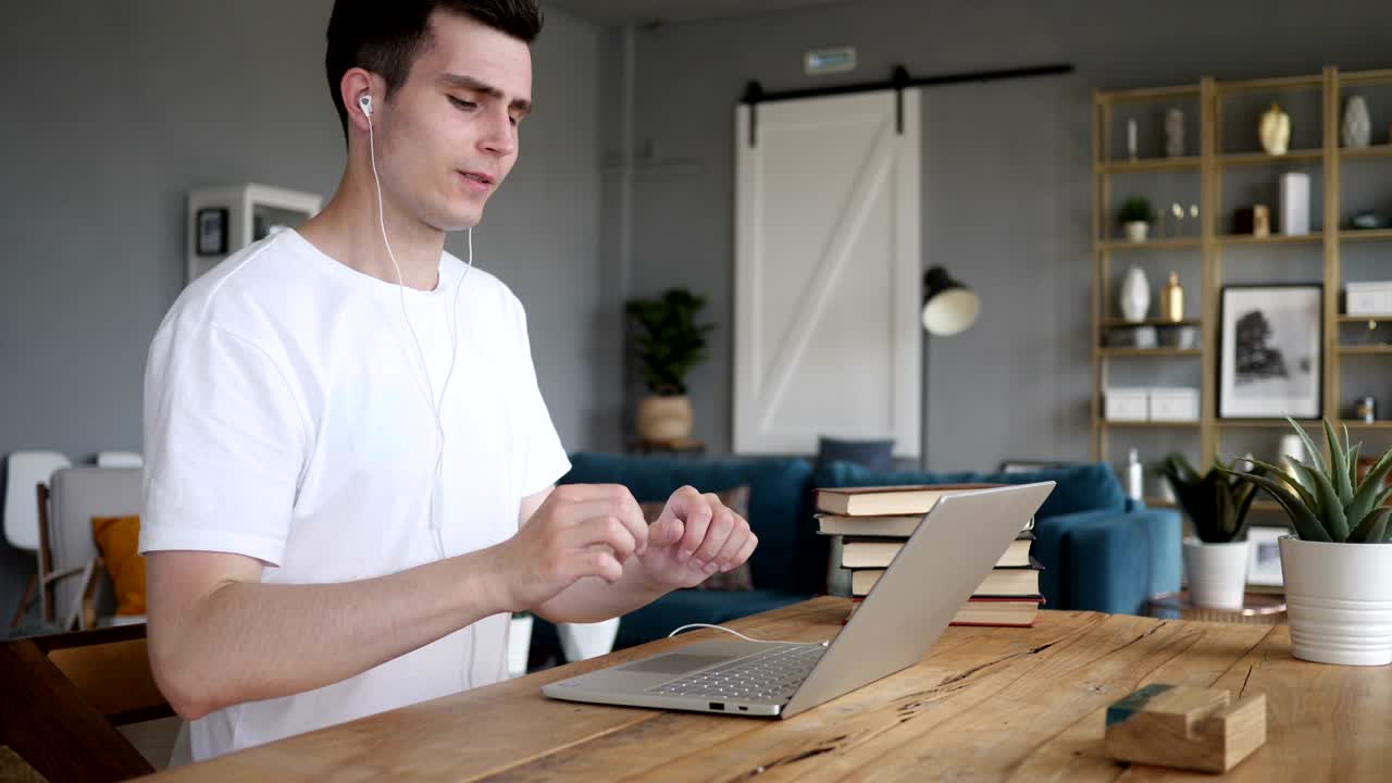 Man Dancing while Listening Music on Earphones